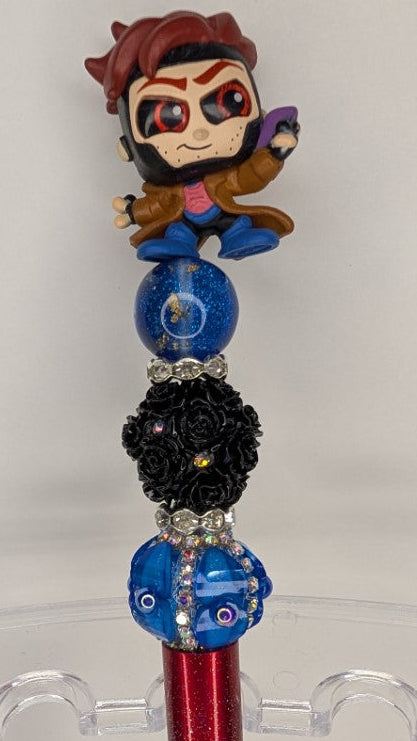 Decorative pen with a character top on a white background